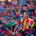 Crowd of celebrateers in Spain flag colors, confetti falling during a victory parade.